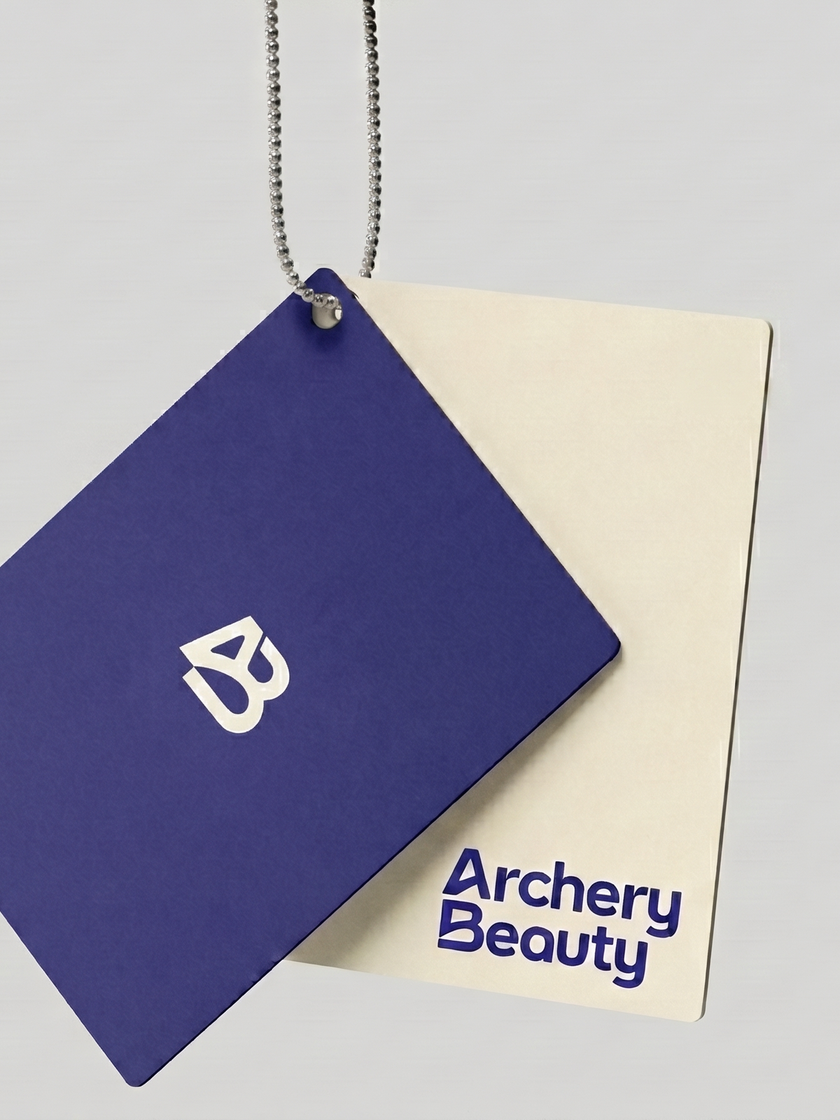 ArcheryBeauty Duplex Hangtags in Deep Indigo and Warm Cream with Nickel Chain